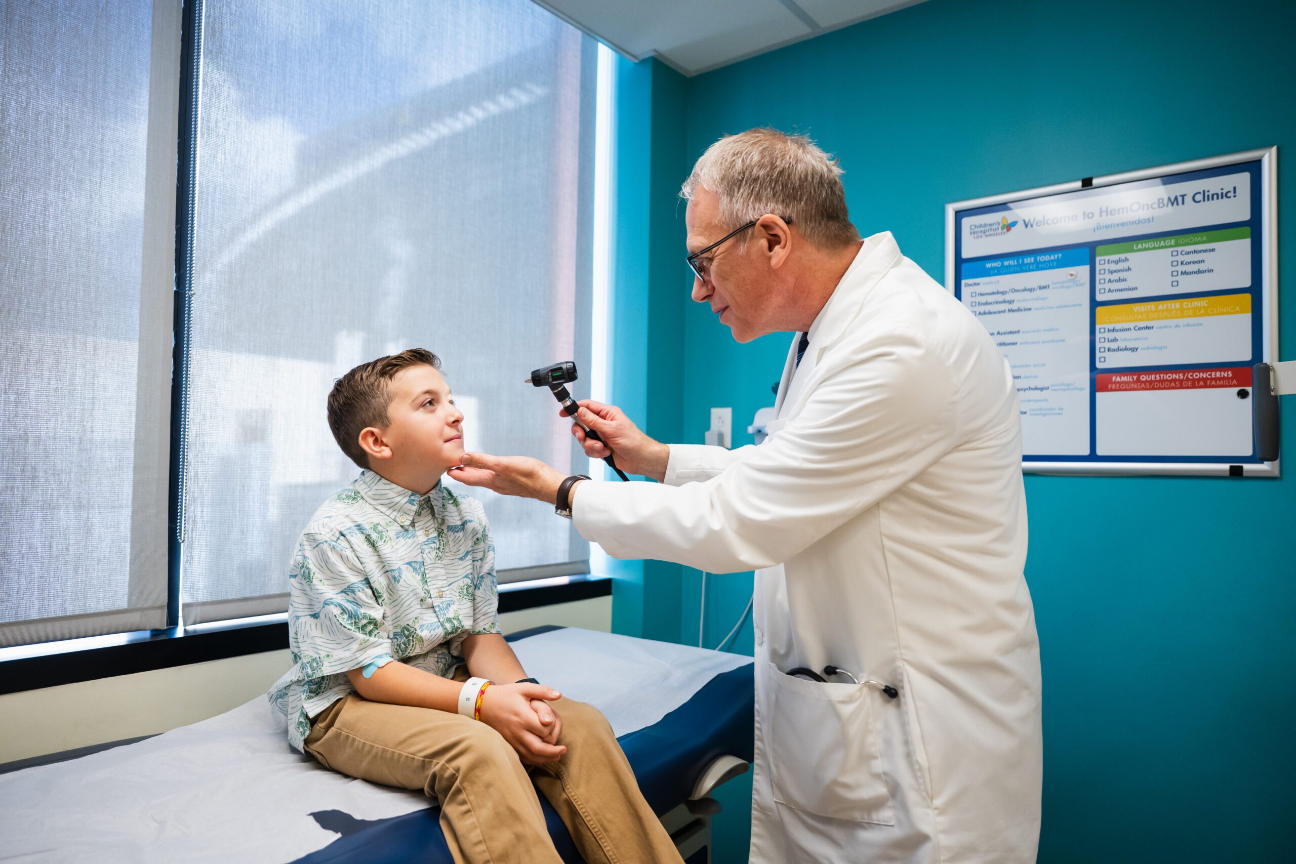 Champion Pierce being seen by a doctor.